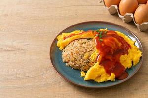 Flavored Fried Rice in an Omelet Wrapping photo