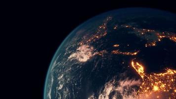 Earth planet viewed from space at night showing the lights of countries video