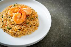 fried shrimps fried rice on plate photo