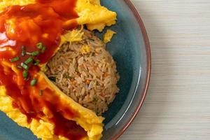 Flavored Fried Rice in an Omelet Wrapping photo