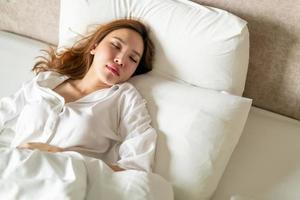 portrait beautiful woman sleeping on bed photo