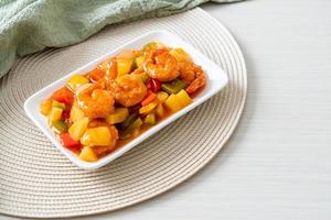 Stir-fried sweet and sour with fried shrimp photo