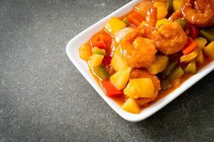 Stir-fried sweet and sour with fried shrimp photo