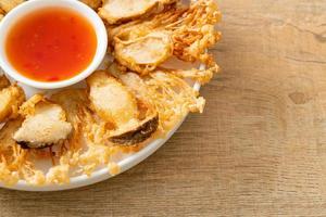 deep fried Enoki mushroom and King Oyster mushroom with spicy dipping sauce photo