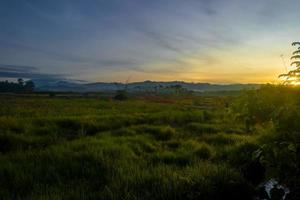 Morning sky in rural field photo