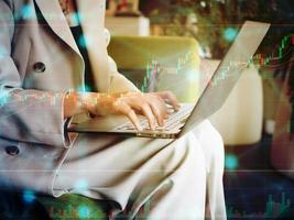 Businesswoman finger hand keyboard notebook computer tablet smartphone mobile technology digital online job work report document trade business money stock market financial chartgraph investment data photo