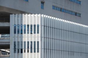 Part of a modern building with orderly stripes photo