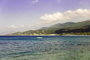 beach on the sea on a bright sunny summer day photo