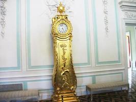 Old grandfather clock in a empty room. photo