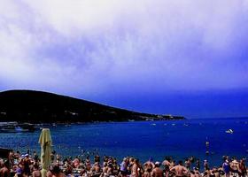 beach on the sea on a bright sunny summer day photo