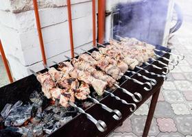 Beef steaks on the grill with flames photo