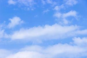 Clouds and blue sky background with copy space photo