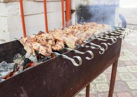 Beef steaks on the grill with flames photo