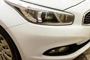 red headlight of a car close -up photo