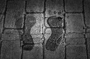 Footprints on zebra crossing photo