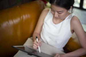 asian female working at home photo