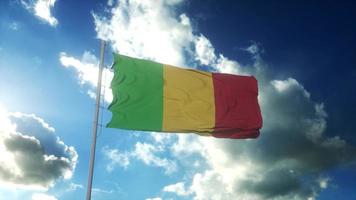 Flag of Mali waving at wind against beautiful blue sky. 3d rendering photo