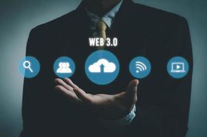 Businessman selecting web 3.0 on virtual screen. photo