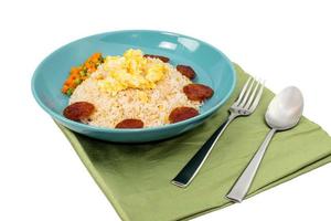 vegetable fried rice with sausage egg carrot bean on white background. photo