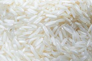 White rice grain pattern close up, Asian food. photo