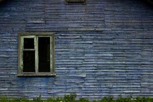 old wooden window on a wall photo