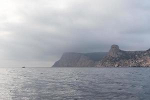 Seascape with a view of the rocky coastline. photo