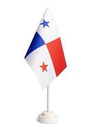Small table flag of Panama isolated on white background photo
