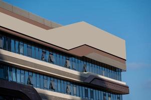 Part of modern urban glass mixed buildings is in blue sky and good weather photo