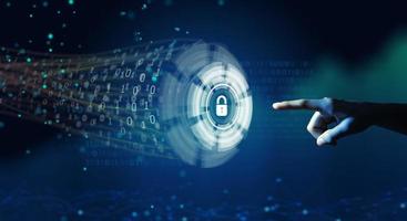Businessman using High-tech of Cyber Security system hologram to block a cyber attack. Business and Network security concept. photo