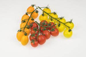 tomatoes on a white background photo