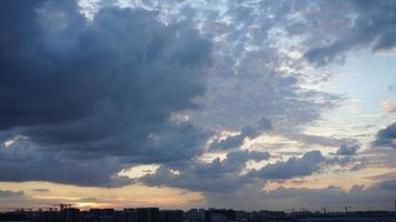 The beautiful sunset view with the silhouette and colorful clouds sky in the city photo