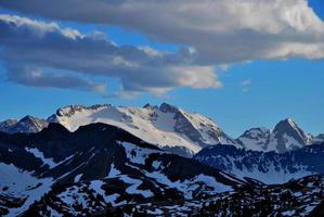 mountain chain with snow photo