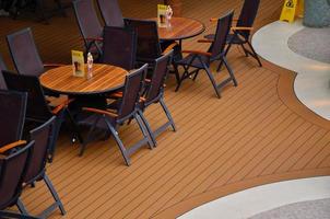 tables in relaxing area on ship photo