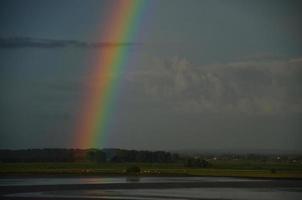 rainbow on the sea close photo