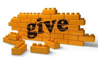 give word on yellow brick wall photo