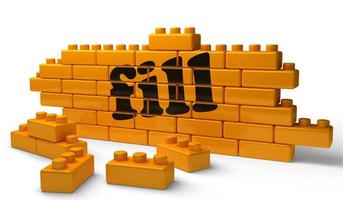 fill word on yellow brick wall photo