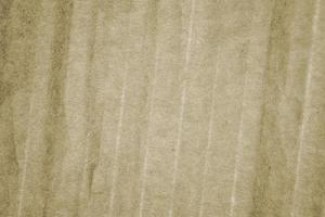 abstract lite brown paper luxury vintage futuristic texture with glossy elegant crack texture on lite brown. photo