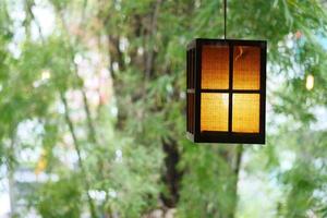 a glowing lamp in a nature with copy space photo