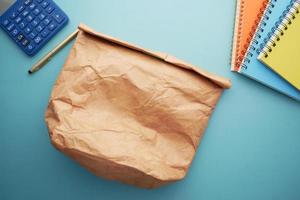 top view of a lunch packet on color background photo