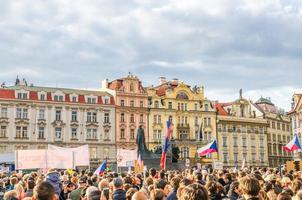 Prague, Czech Republic, May 13, 2019 Czechs people with flags at demonstration protest against Prime Minister Andrej Babis on Old Town Square Stare Mesto in historical city centre photo