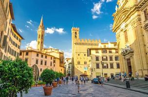 Florence, Italy, September 15, 2018 Piazza di San Firenze square with Chiesa San Filippo Neri, Badia Fiorentina Monastero catholic church and Bargello museum in historical centre of city, Tuscany