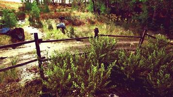 old wooden fence and dirt road in the countryside at summer season video