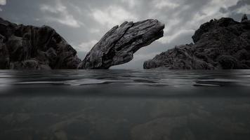 Half underwater in northern sea with rocks video