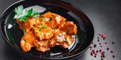 meat stewed tomato sauce pork beef chicken fresh healthy meal food photo