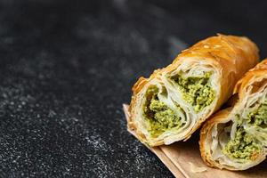 rollini spinach, cheese savory pastries puff pastry fresh photo