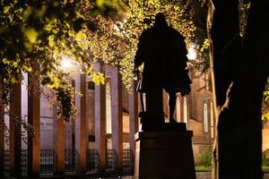 Monument to Duke Albrecht and Immanuel Kant grave at night, Memorial for german philosopher, Kaliningrad, Koenigsberg, Russia. photo