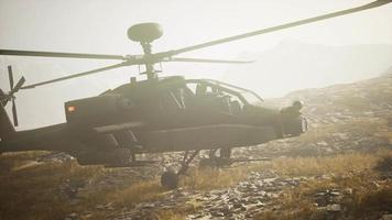 military helicopter in mountains at war video