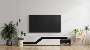 tv led en la pared blanca de la sala de estar, diseño minimalista.