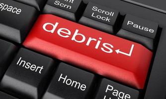 debris word on red keyboard button photo