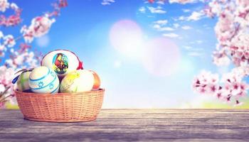 Easter background with colorful easter eggs on wooden background. photo